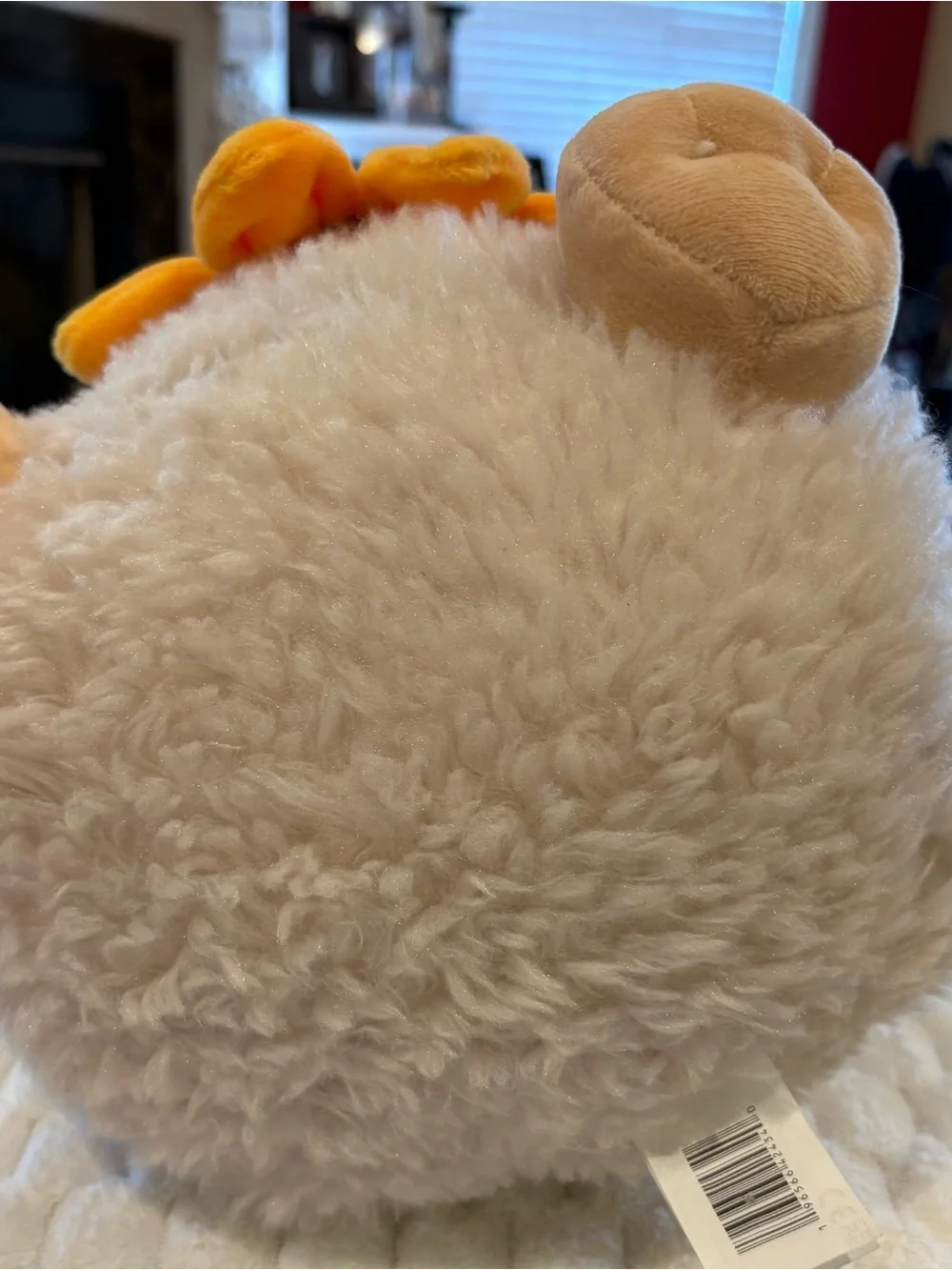 24” Russ sunflower cuddle Guinea Pig Plush holding a small yellow sunflower